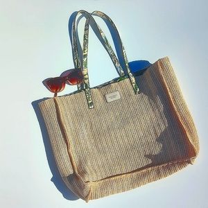Victoria Secret Beach Tote. Woven Straw and  lined with tropical fabric. NWOT
